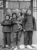 Family Standing Outside Their One Room Abode Premium Photographic Print by George Lacks