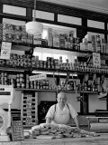 Butcher Standing at Meat Counter of Deli Premium Photographic Print by Alfred Eisenstaedt