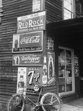 Food Store Called Leo's Place Covered with Beverage Ads Incl. Coca Cola, 7 Up, Dr. Pepper and Pepsi Photographie par Alfred Eisenstaedt