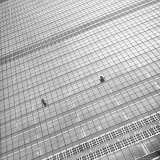 Window Cleaners Cleaning Windows High Up on the United Nations Building Photographic Print by Andreas Feininger