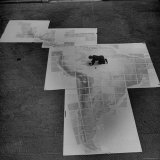 Man Works on Map of Latin and South America under Supervision of Political Geographer Isaiah Bowman Photographic Print by Alfred Eisenstaedt