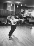 Child Bowling at a Local Bowling Alley Photographie par Art Rickerby