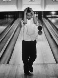 Child Bowling at a Local Bowling Alley Fotografisk trykk av Art Rickerby