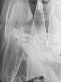 Double Ring Ceremony in Oakes, North Dakota, Bride is Putting Ring on Groom's Finger Photographic Print by Michael Rougier