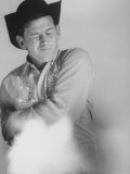John Riddle Contestant in National Fast Draw Championships Premium Photographic Print by J. R. Eyerman