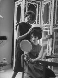 Jackie Kennedy Style Pillbox Hats Being Tried on by Models at Charles A. Stevens and Co Premium Photographic Print by Francis Miller