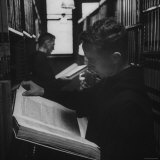 Two Monks in the Library at St. Benedicts Abbey Photographie par Gordon Parks