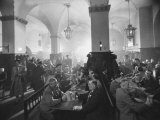 Interior of Munich Beer Hall, People Sitting at Long Tables, Toasting Fotografie-Druck von Ralph Crane