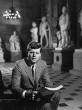 Senator John F. Kennedy Seated in Museum with Statues Premium Photographic Print by Hank Walker