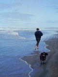 Presidential Candidate Bobby Kennedy and His Dog, Freckles, Running on an Oregon Beach Photographic Print by Bill Eppridge