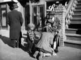 Harlem Street Scene Showing a Man Getting a Shoeshine as a Young Child Watches Intently Photographic Print
