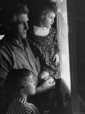 Grandpa with Grandchildren, Looking Out Kitchen Door, to a View He's Always Loved Photographie par Gordon Parks