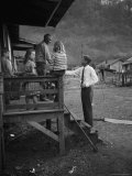 Senator John F. Kennedy Greeting Rural Family While Campaigning For President Premium Photographic Print by Hank Walker