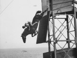 In Mid Air the Horse Sails Gracefully Toward the Tank Premium Photographic Print by Peter Stackpole In Mid Air the Horse Sails Gracefully Toward the Tank Premium Photographic Print by Peter Stackpole