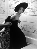 Restaurant Fashions: Cartwheel Hat, Strapless Evening Dress and Stole Photographic Print by Nina Leen