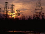 Oil Derricks at Sunset at Baku, Azerbaijan, Ussr Photographic Print by Stan Wayman