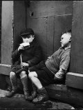 Two Boys Sitting on Doorstep Premium Photographic Print by Nat Farbman
