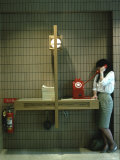 Woman Using Telephone in Keio University Library Designed by Fumihiko Maki Premium Photographic Print by Ted Thai