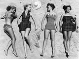 Models Sunbathing, Wearing Latest Beach Fashions Photographie par Nina Leen