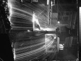Molten Steel Being Poured from an Open Hearth Furnace at Carnegie Illinois Steel Mill Lámina fotográfica de primera calidad por Andreas Feininger