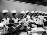 Women Sitting under Hair Dryers in Salon at Saks Fifth Avenue Department Store Photographic Print by Alfred Eisenstaedt