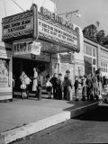 The Movie Theater Boosting Business by Caring For Child Customers on the Weekends Photographic Print by Allan Grant