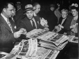 People Buying Newspapers Headlining the June 6, 1944 D-Day Invasion of Nazi Occupied Europe Photographic Print by Gordon Coster