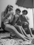 Peter Coe with Martha O'Driscoll Eating Abalone Sandwiches Premium Photographic Print by John Florea