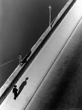 Sunday Morning Along the Arno River, a Man Fishing, and a Passerby Casting a Shadow Premium Photographic Print by Alfred Eisenstaedt