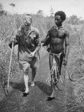 Papuan Native Helping a Wounded Australian Infantryman Along Road Away from the Buna Battlefront Premium Photographic Print by George Silk