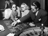 Playing the Roulette Wheel in a Las Vegas Club Premium Photographic Print by Peter Stackpole