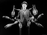 Stroboscopic Image of Juggler Stan Cavenaugh Juggling Tenpins Photographic Print by Gjon Mili