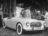 View of a Sleek White Convertible at the Paris Auto Show Photographie par Gordon Parks