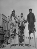 People Walking on Stilts at Spring Festival Celebration Premium Photographic Print by George Lacks