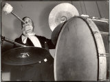 Percussionist Ruben Katz Playing the Bass Drum in the New York Philharmonic Premium Photographic Print by Margaret Bourke-White