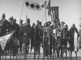People Walking on Stilts at Spring Festival Premium Photographic Print by George Lacks