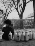 Small Boy Helping Himself to Milk Photographie par Gordon Parks