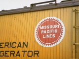 Railroad Box Car Showing the Logo of the Missouri Pacific Railroad Premium Photographic Print by Walker Evans