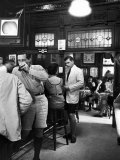 Patrons Inside P.J. Clarke's Saloon Include Men Wearing Bermuda Shorts, a New Fad Photographie par Alfred Eisenstaedt