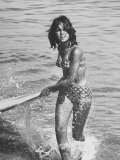 Surf Rider Returning After Surfing Photographic Print by Allan Grant