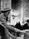 Model Posing in a Train Station in a Tweed Suit Photographie par Gordon Parks