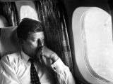 Senator John F. Kennedy on His Private Plane During His Presidential Campaign Photographie par Paul Schutzer