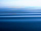 Small Gentle Ripples Move Across the Calm Surface of the Arctic Ocean Photographic Print by Norbert Rosing