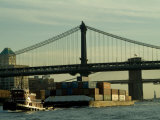 Tugboat Pulling a Barge on the East River Under the Manhattan Bridge Photographic Print by Todd Gipstein
