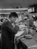 Senator John F. Kennedy Drinking a Cup of Coffee at a Cafe in Washington Airport Photographic Print by Ed Clark