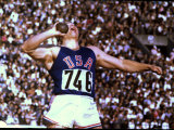 US Athlete in Action During the Shot Put at the Summer Olympics Premium Photographic Print by John Dominis