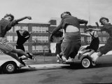 Students Participating in a Cheerleading Practice Premium Photographic Print by Paul Schutzer