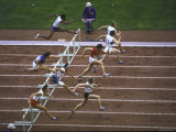 Women Athletes Perform in a Hurdle Event at the Summer Olympics Premium Photographic Print by George Silk