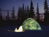 A Warm Glow Eminates from an Igloo Photographic Print by Norbert Rosing