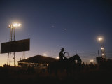 A Horse and Rider Prepare for the Rodeo at the New Mexico State Fair Photographic Print by Stephen Alvarez